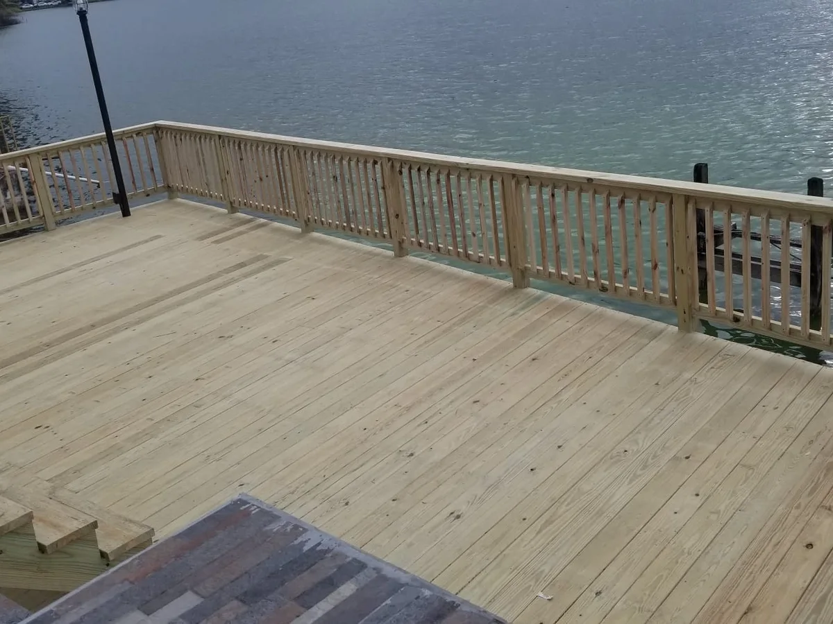 Large wood deck we built in a backyard