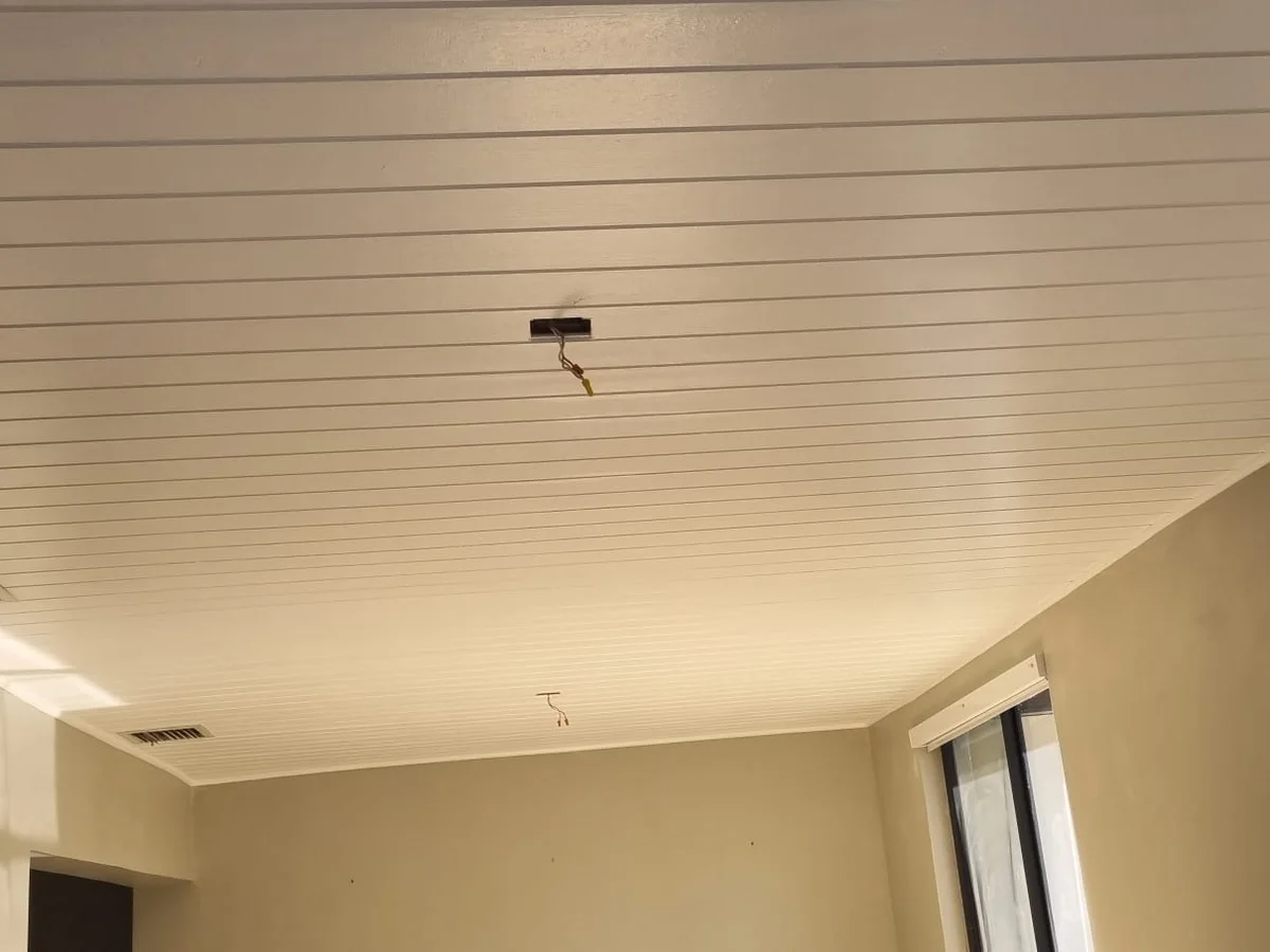 Finished remodeled room with new ceiling and floor