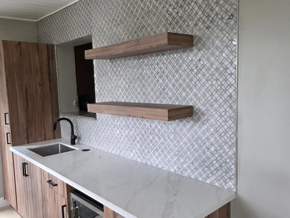 Remodeled kitchen with wood cabinets
